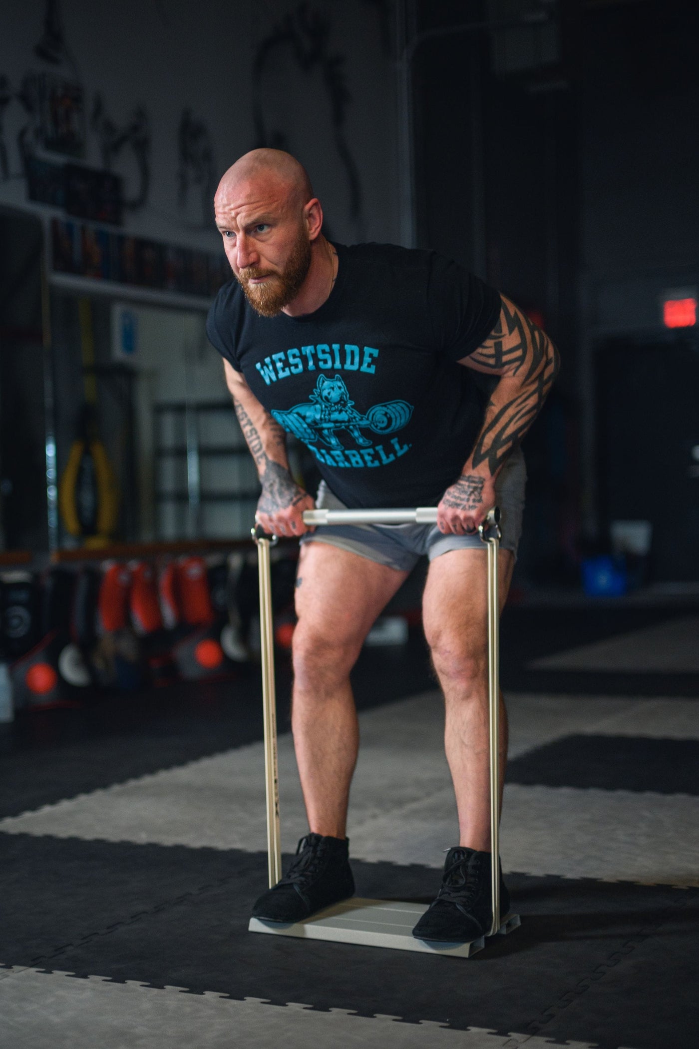 Craig performing an X3 bicep curl